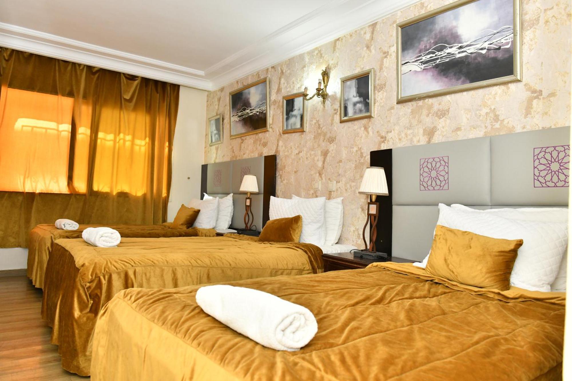 Chambre Triple - Vue sur Ville